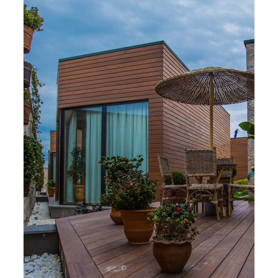 https://www.produits-traitement-bois.com/Files/30848/Img/15/traitement-bois-composite-saturateur-exterieur-maison-style-moderne-terrasse.jpg